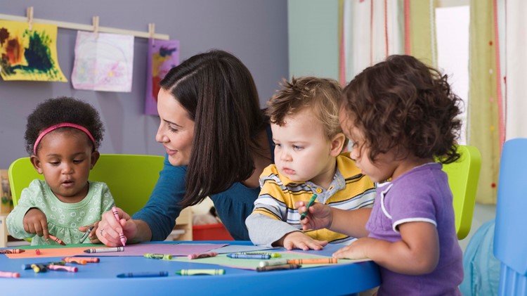 Teacher and toddlers in daycare CDC FCC web.jpg